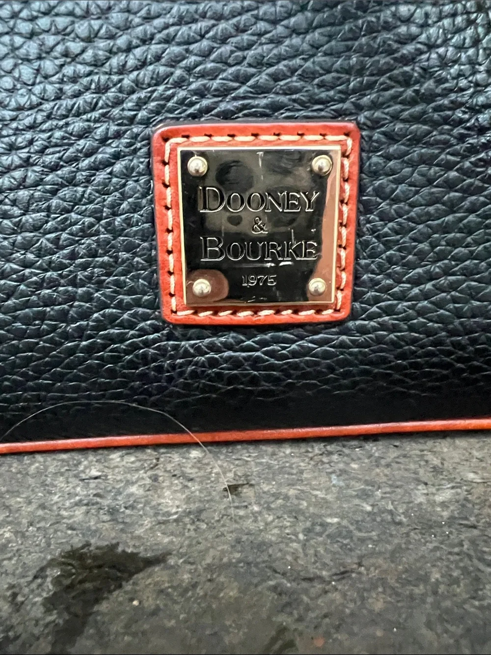 Dooney & Bourke Black Pebbled Leather Messenger with Brown Trim